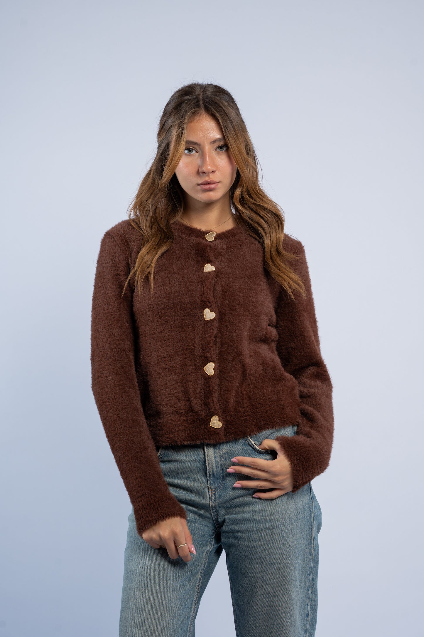 Brown knit cardigan with heart shaped buttons