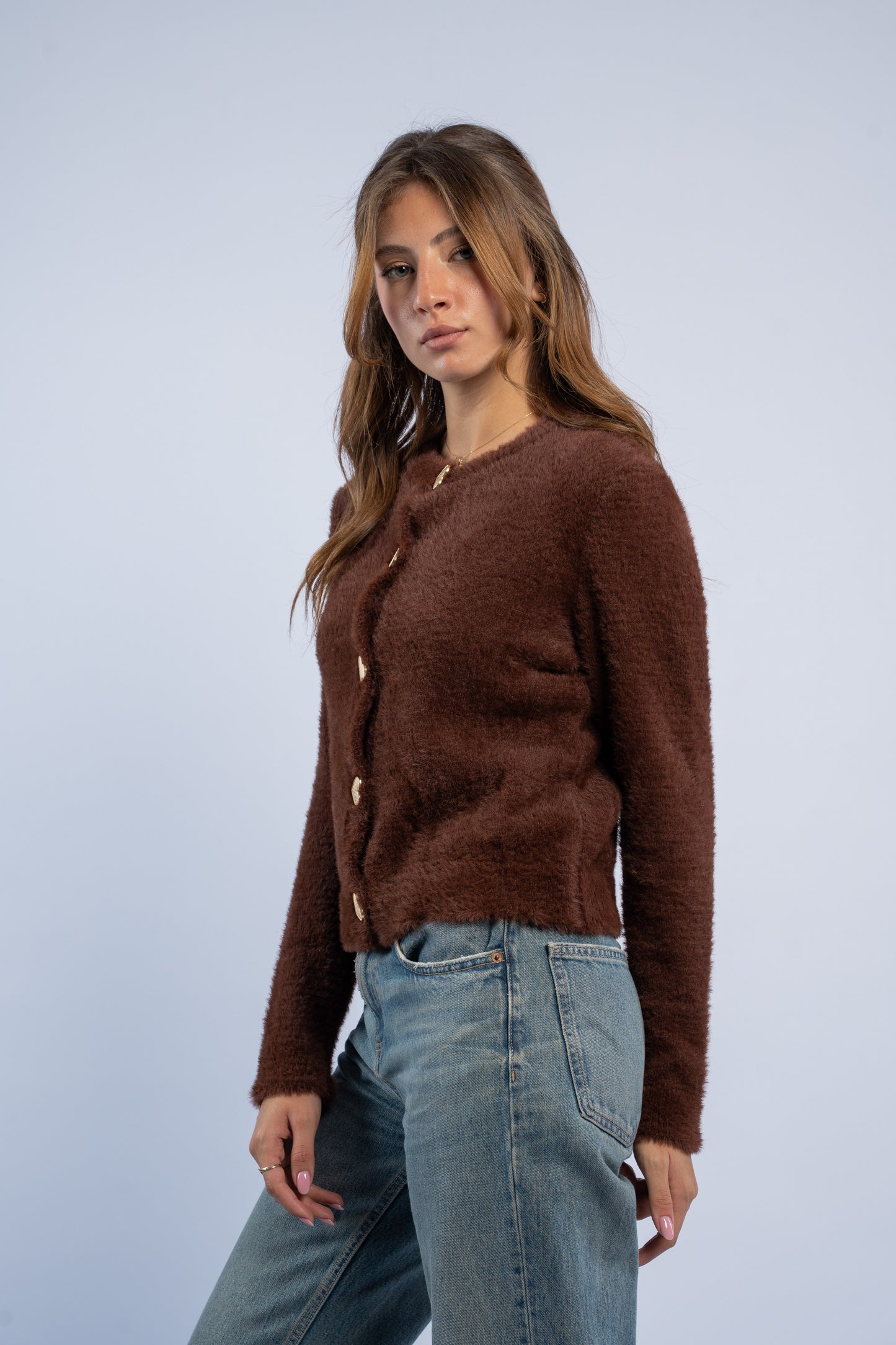 Brown knit cardigan with heart shaped buttons