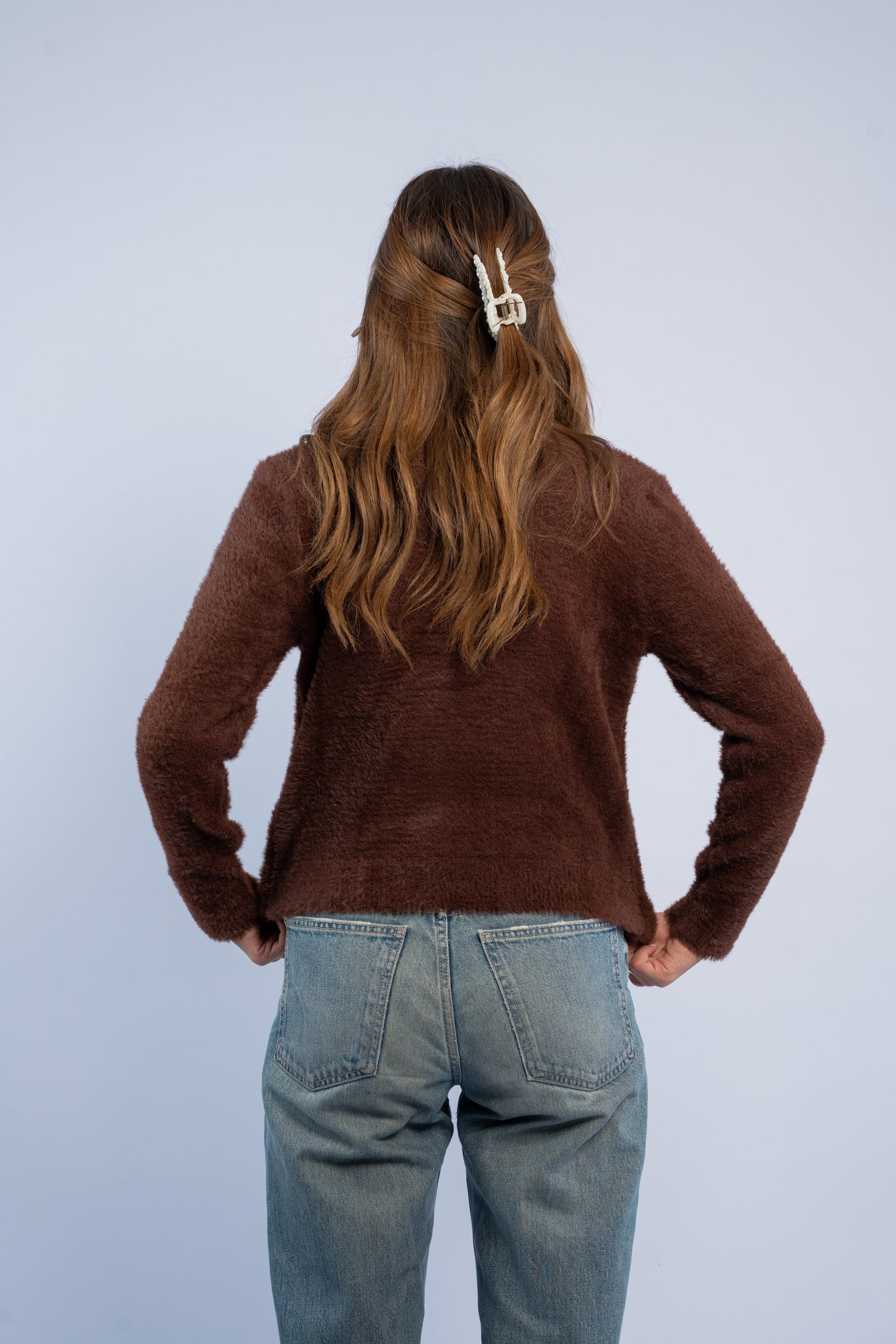 Brown knit cardigan with heart shaped buttons