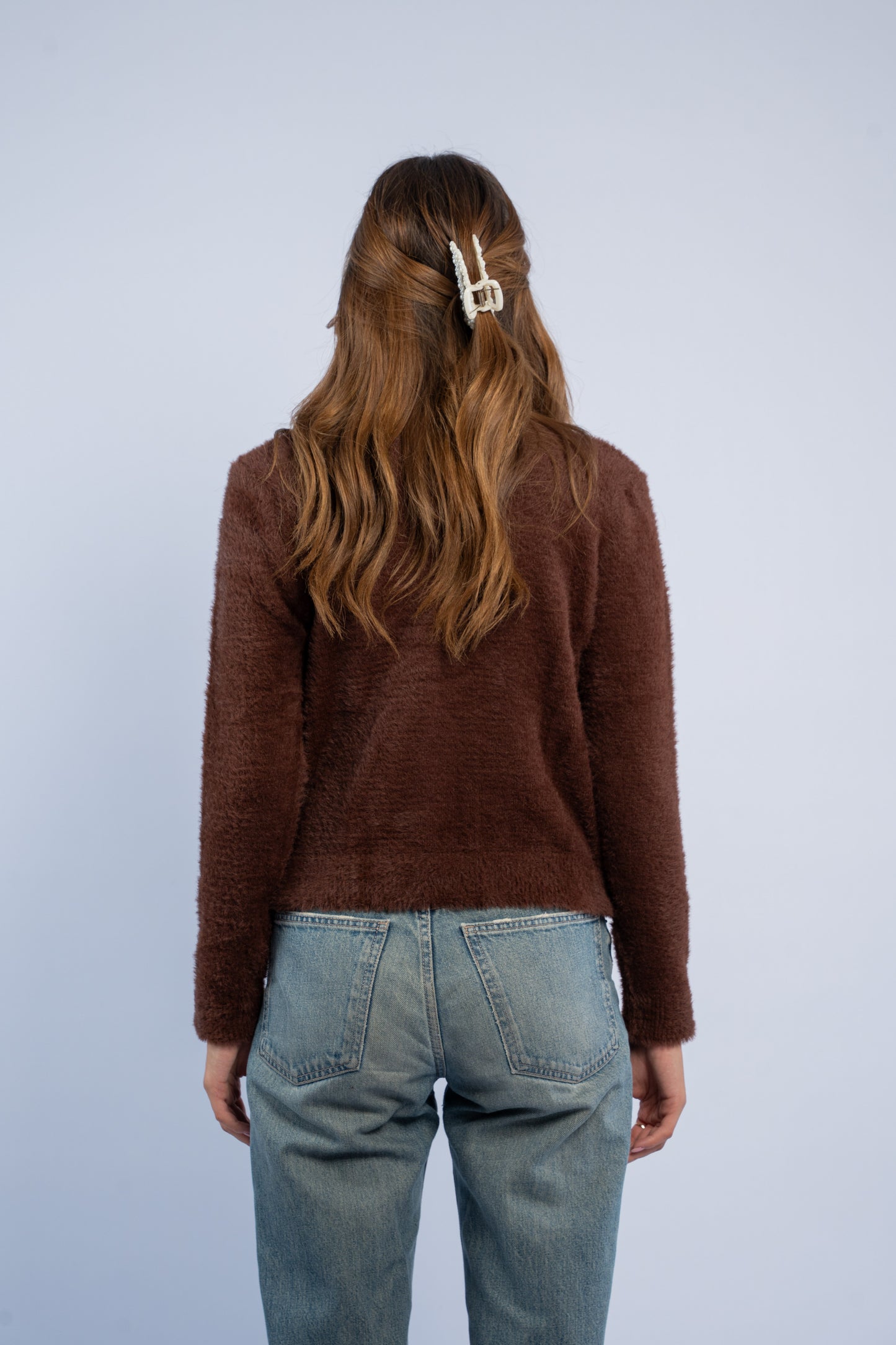 Brown knit cardigan with heart shaped buttons