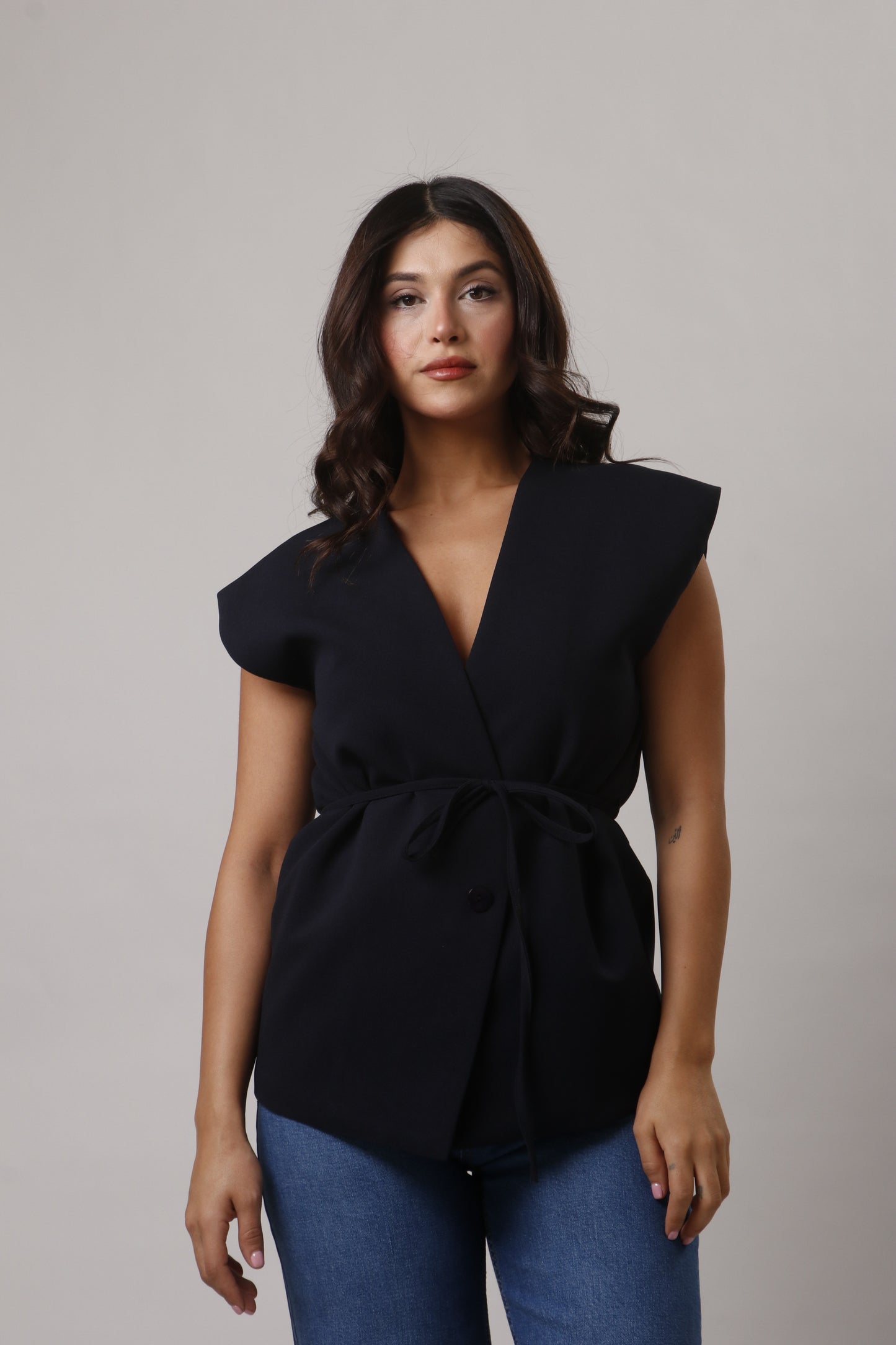 Vest with belt