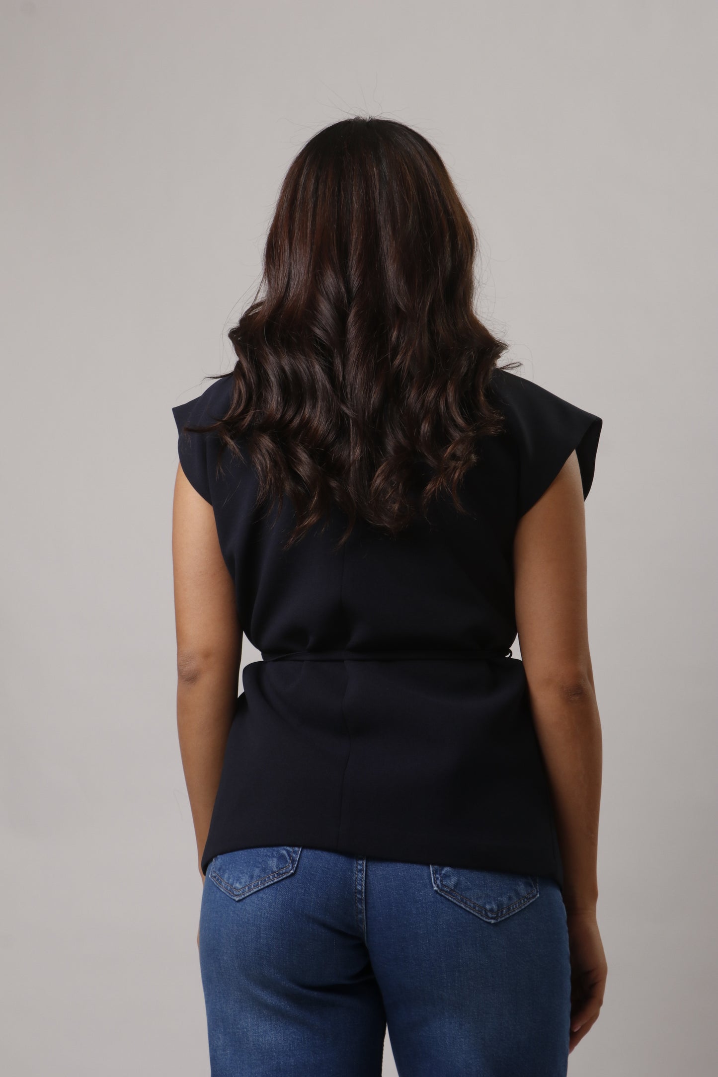 Vest with belt