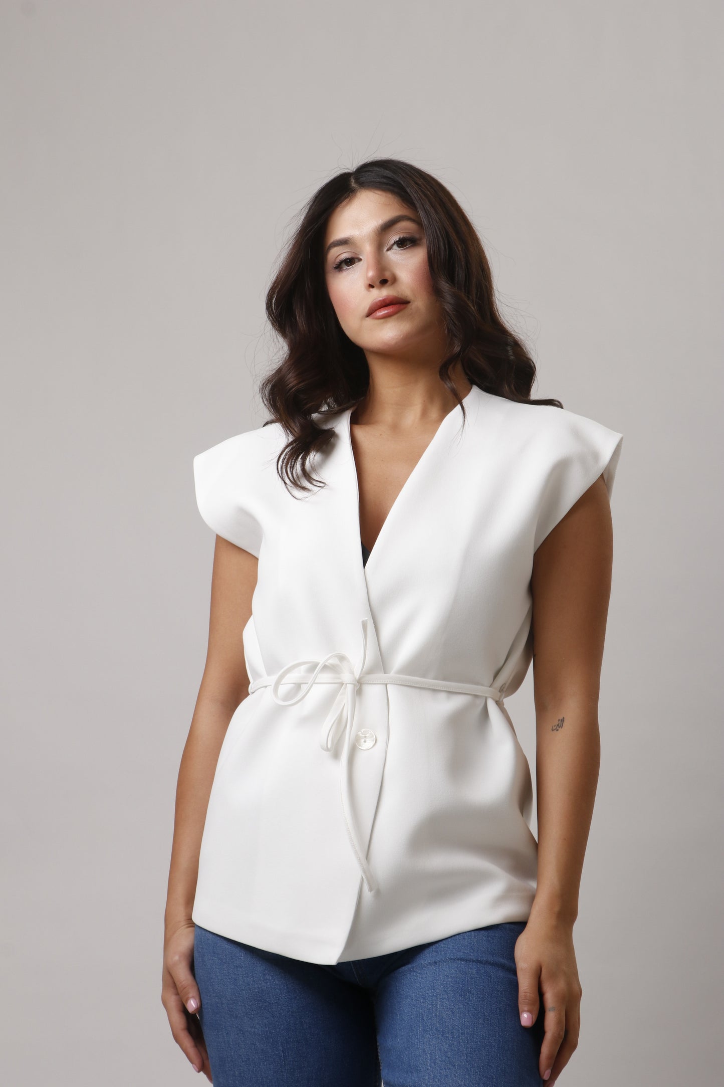 Vest with belt