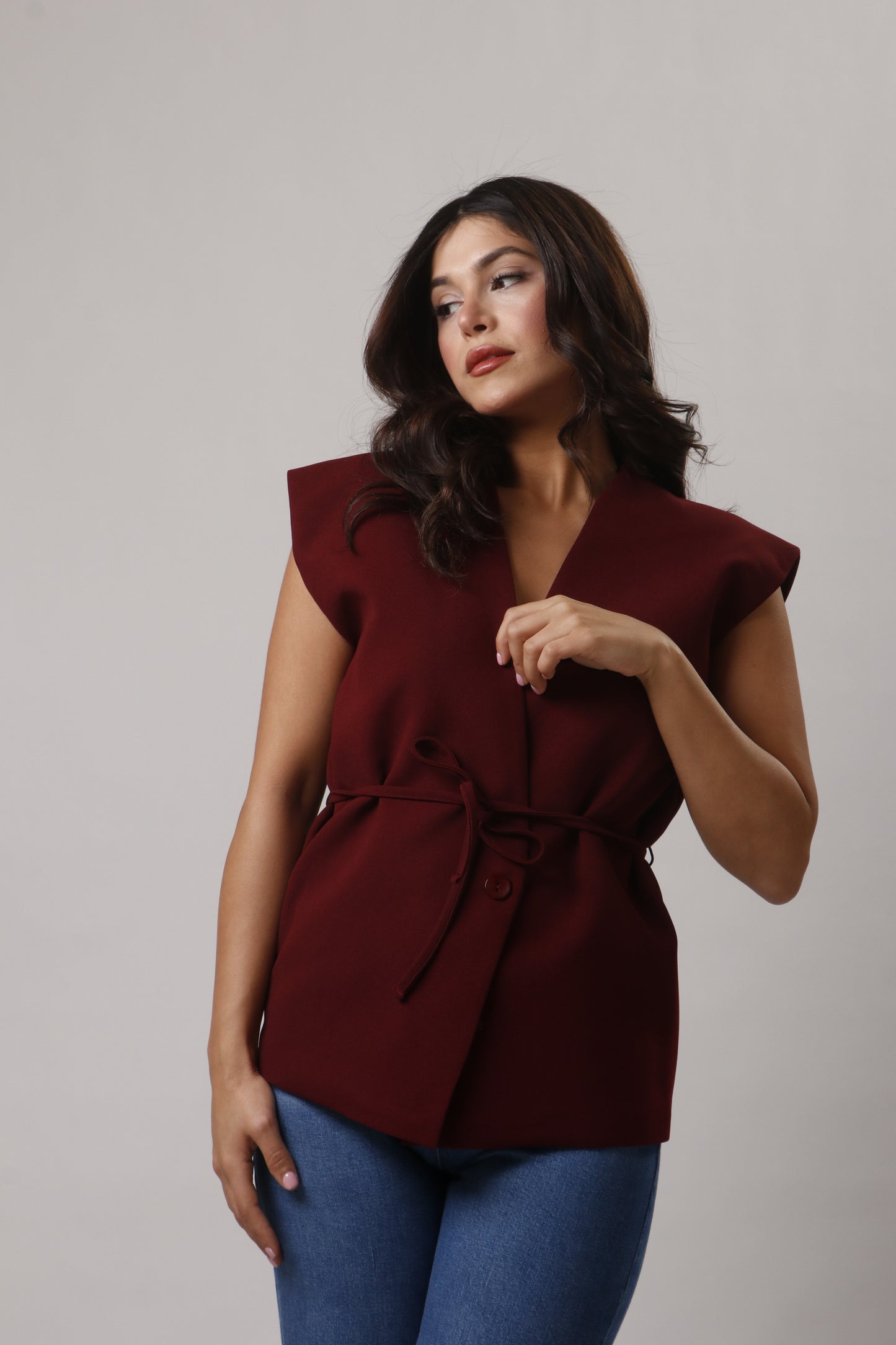 Vest with belt