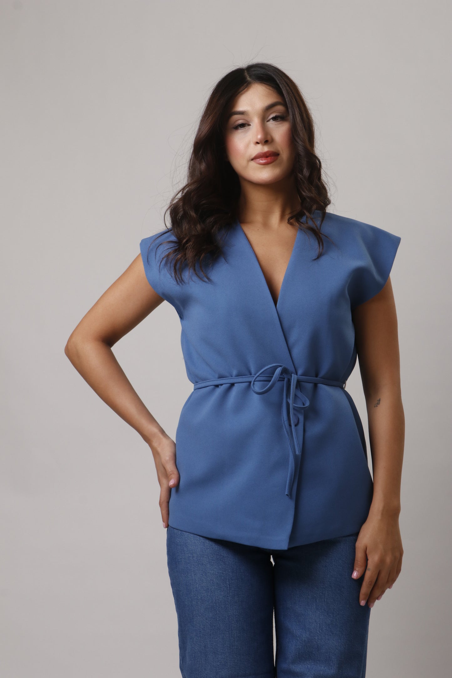 Vest with belt