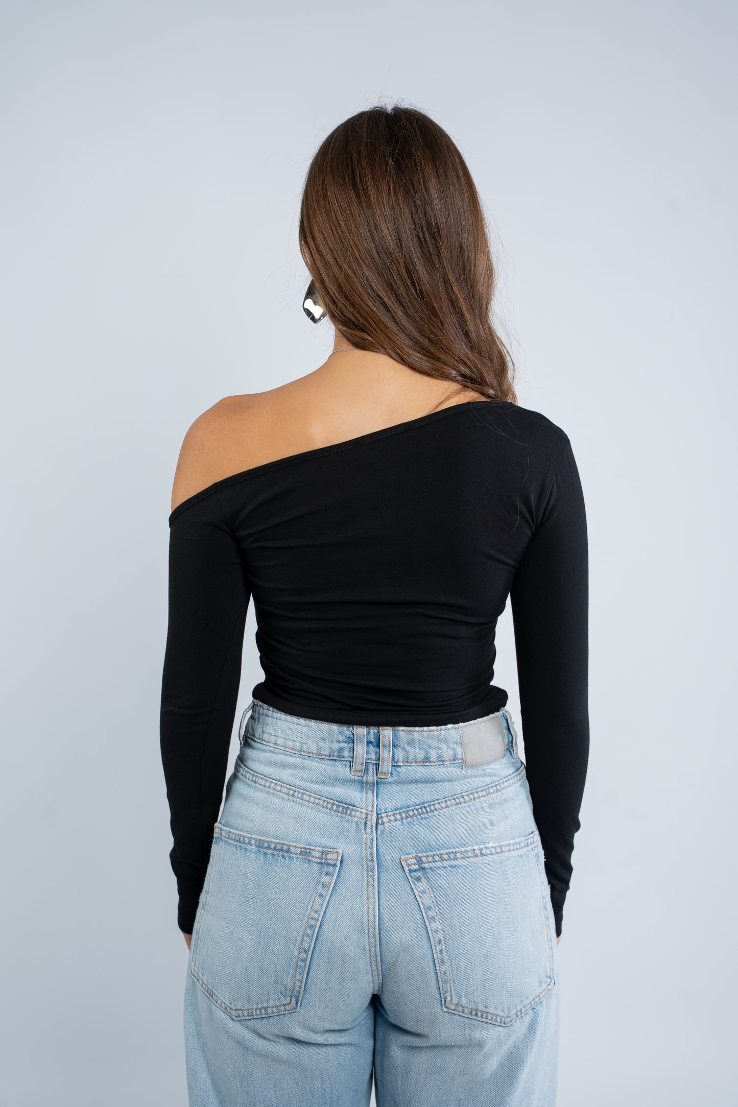 Long sleeve asymmetric shoulder top