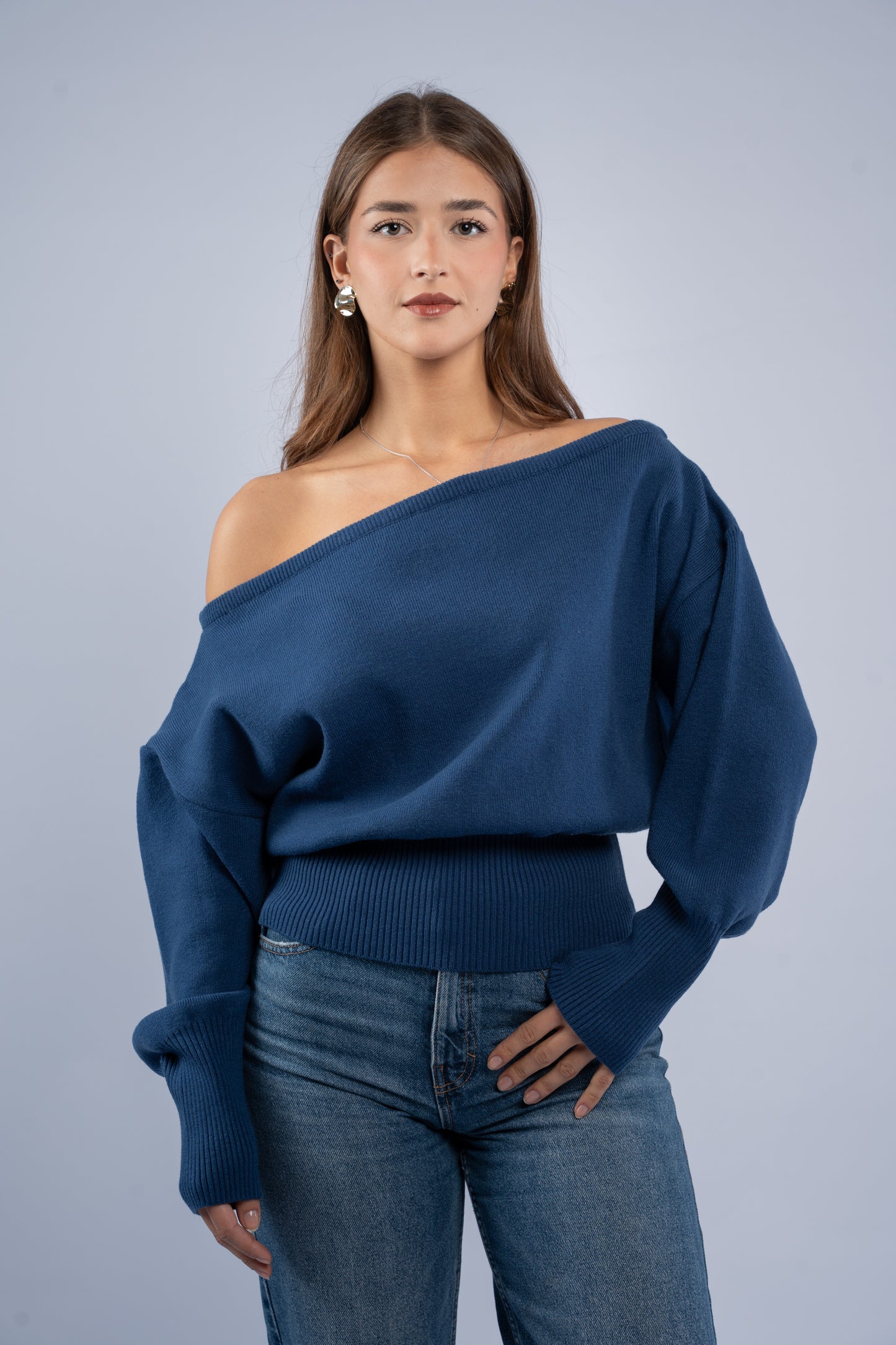 Asymmetrical waist-defined knit top