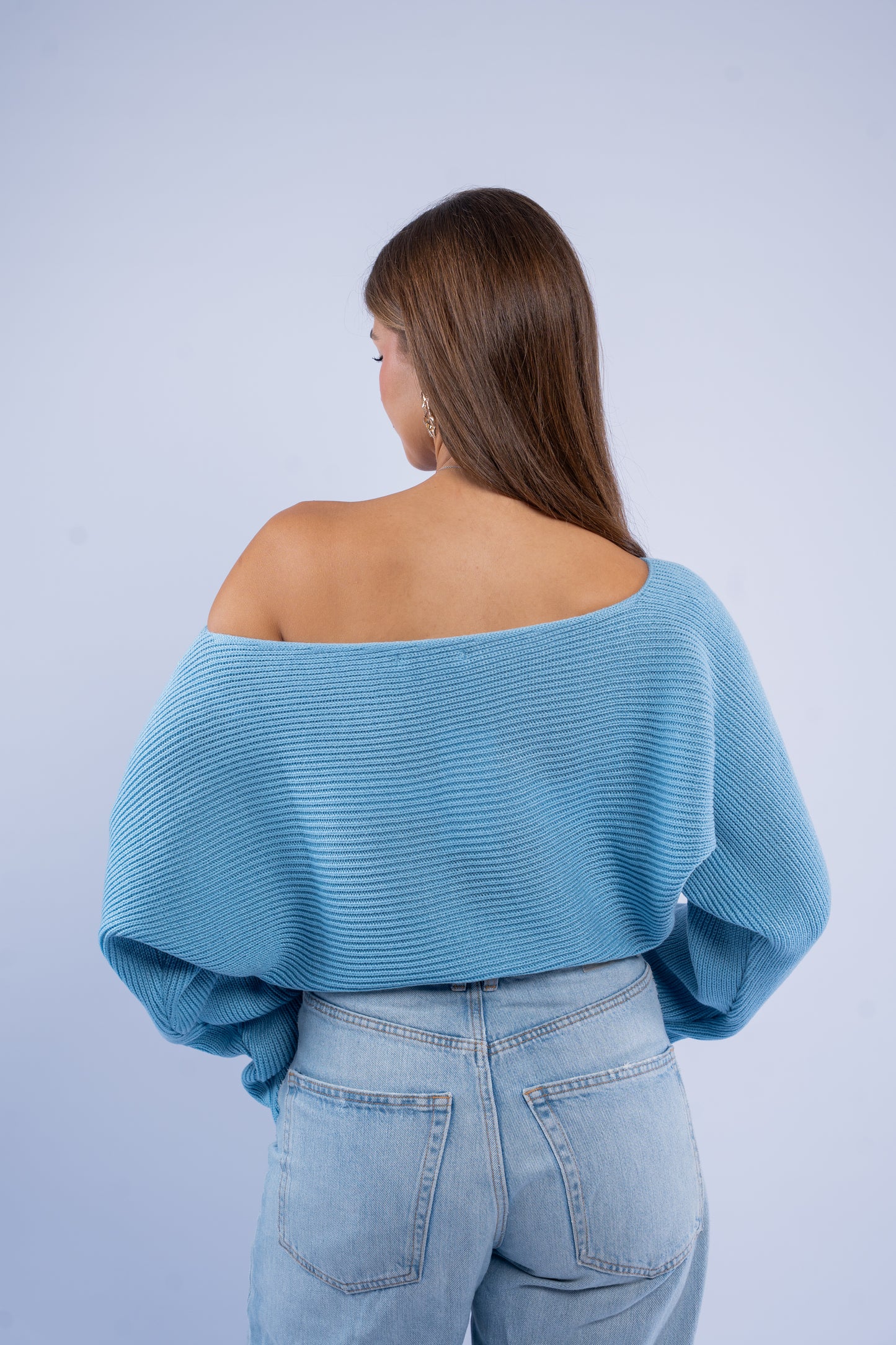 Asymmetric wool top
