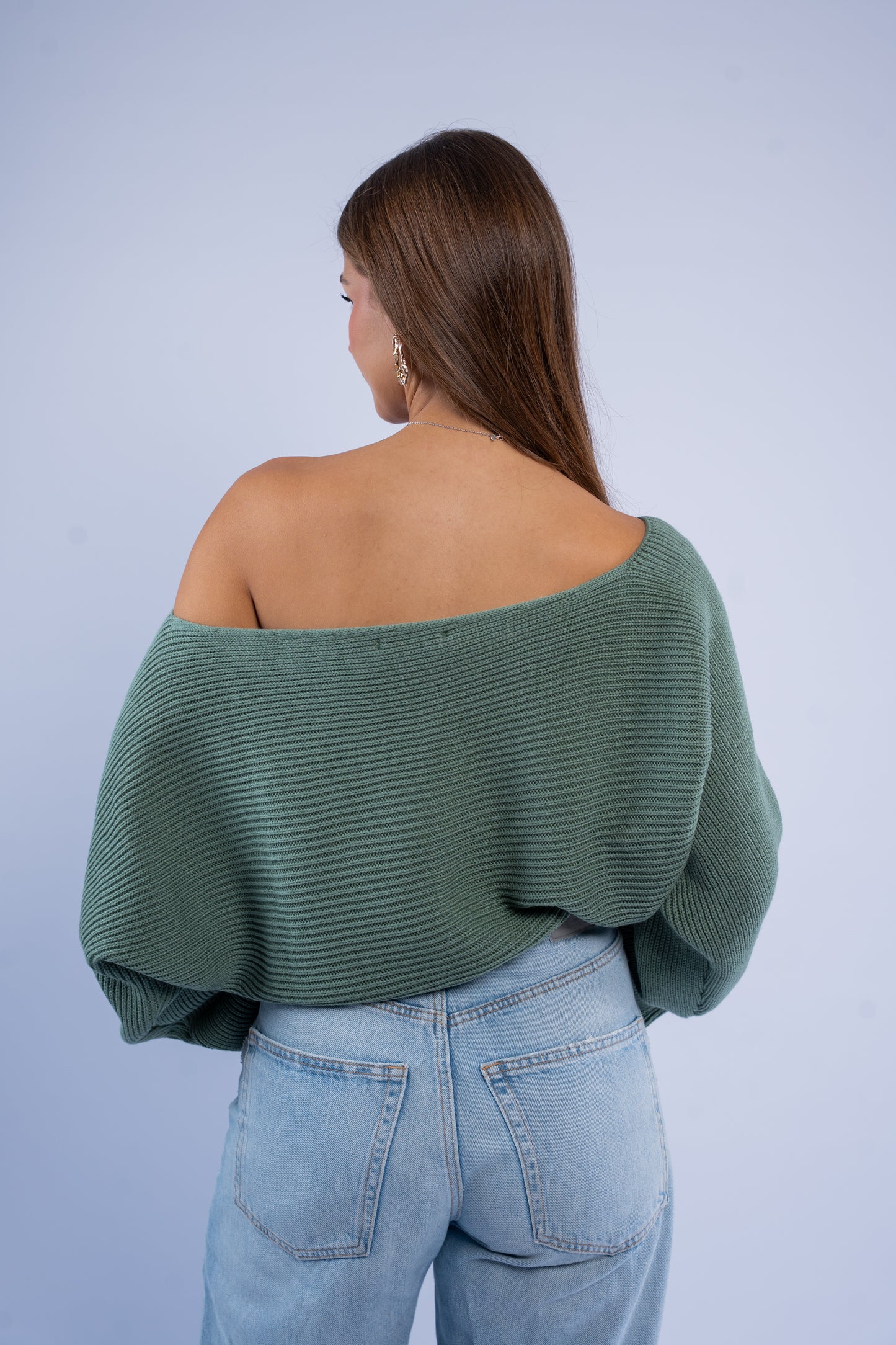Asymmetric wool top