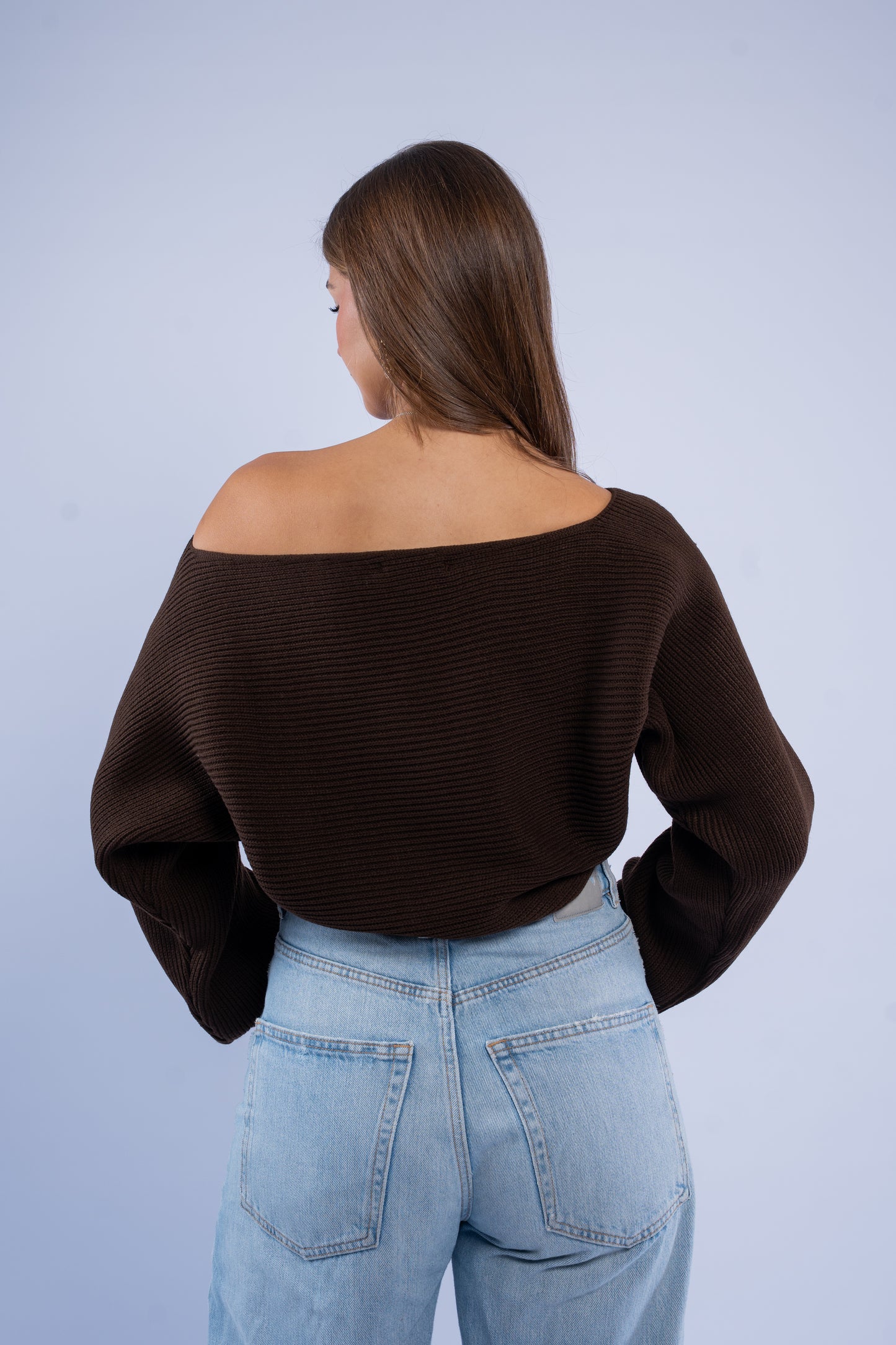 Asymmetric wool top