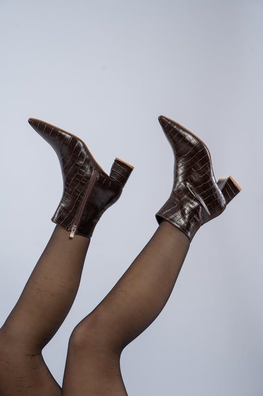 The pointed heel ankle boots