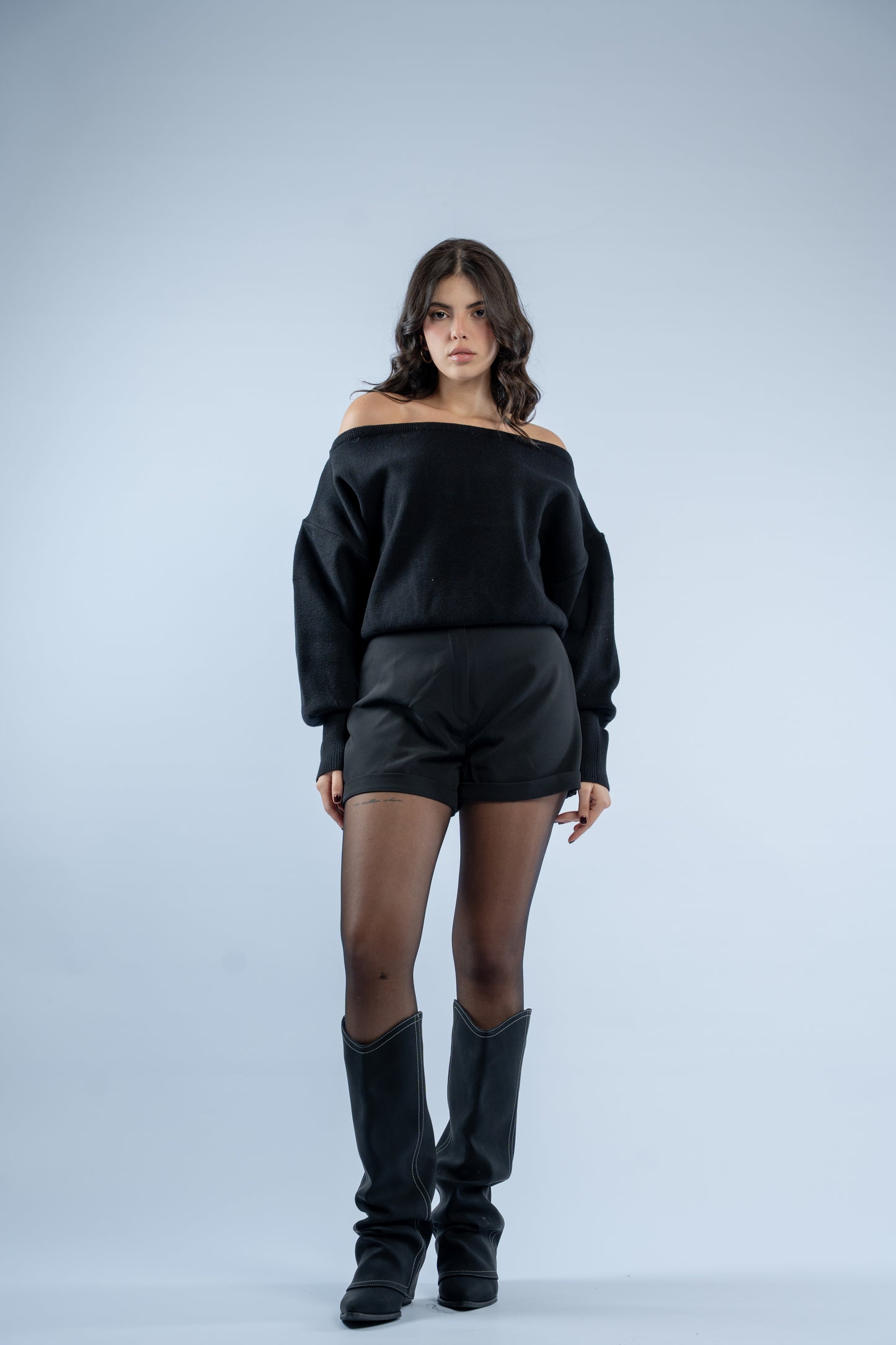 Asymmetrical waist-defined knit top