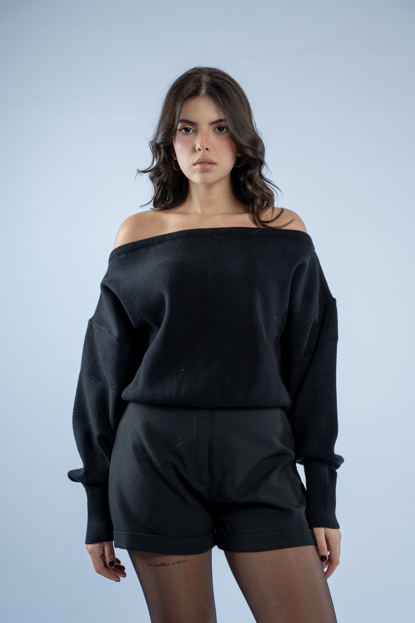 Asymmetrical waist-defined knit top
