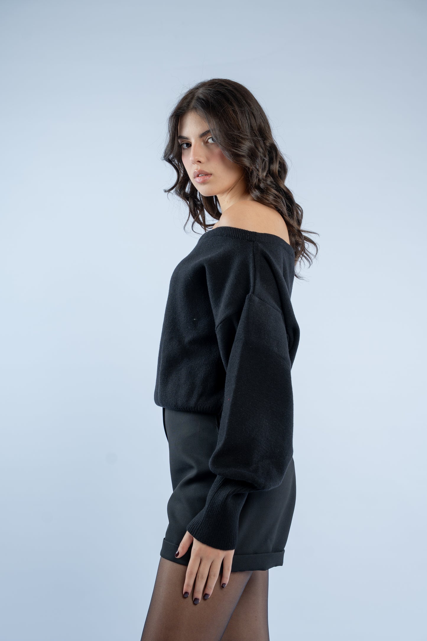 Asymmetrical waist-defined knit top