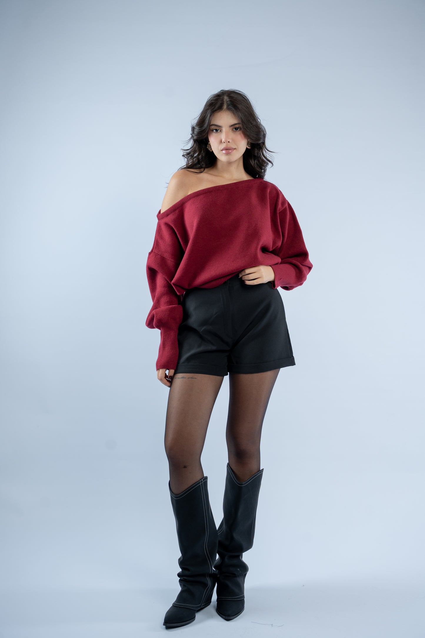Asymmetrical waist-defined knit top
