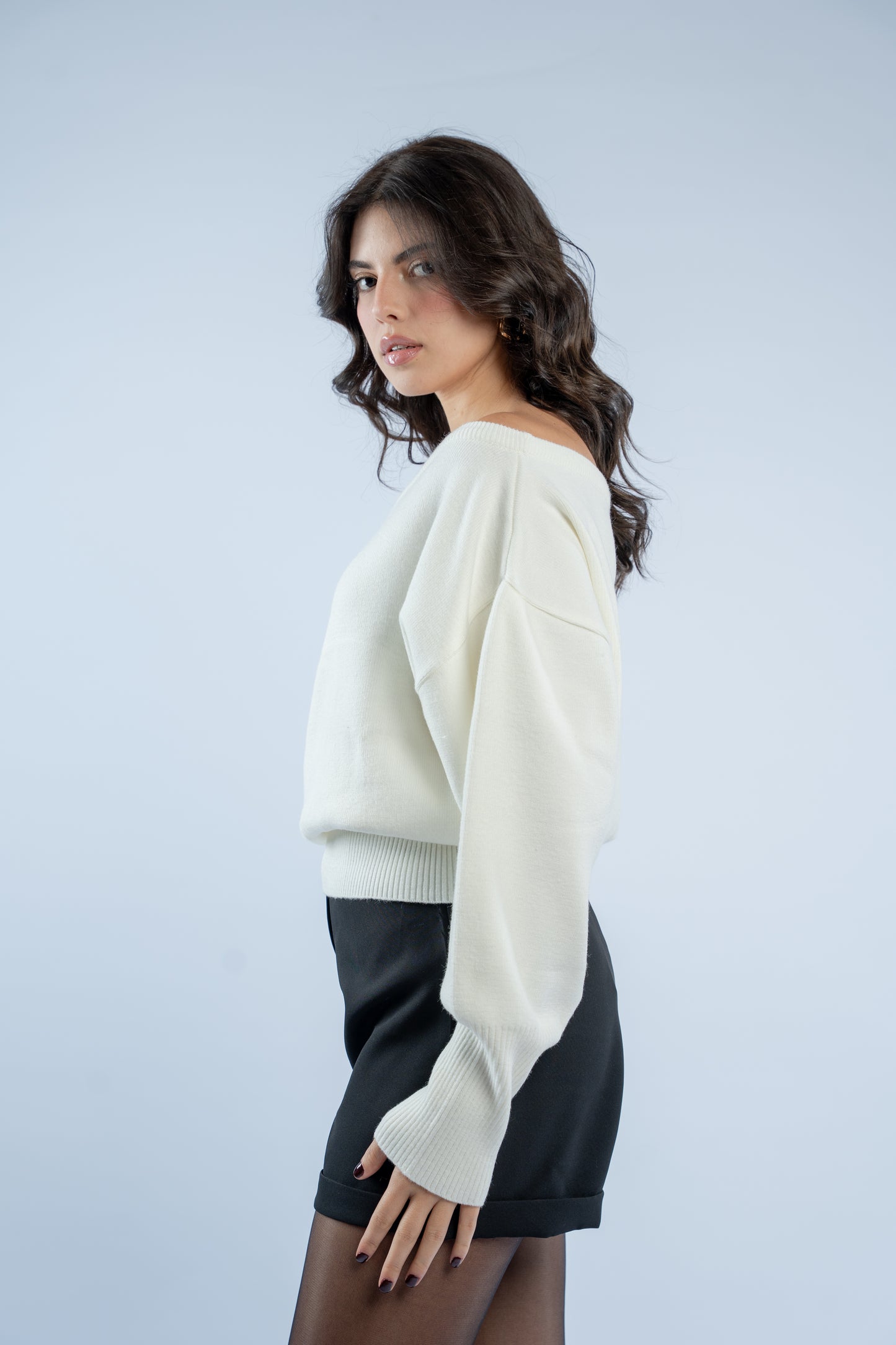 Asymmetrical waist-defined knit top