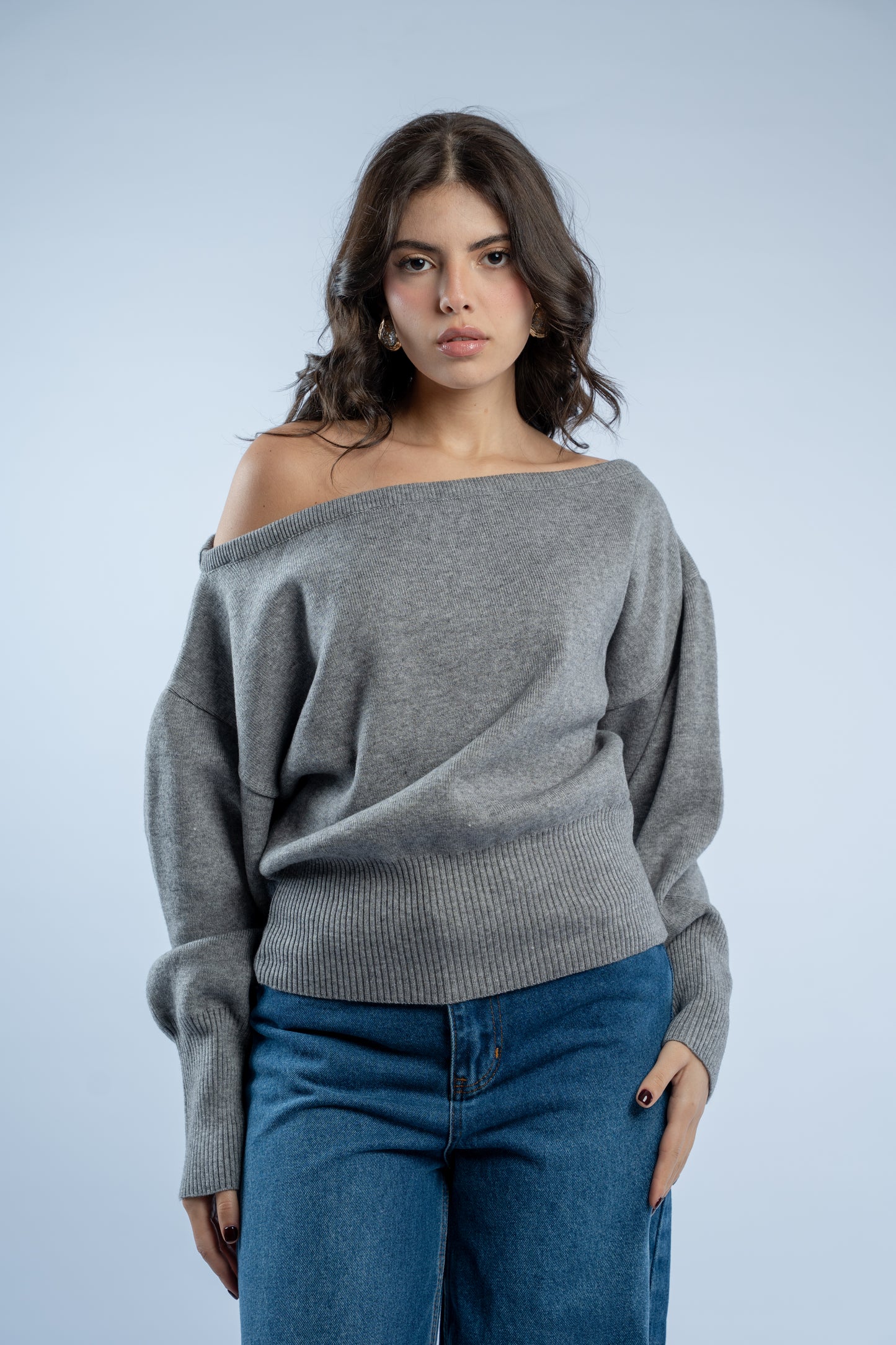Asymmetrical waist-defined knit top