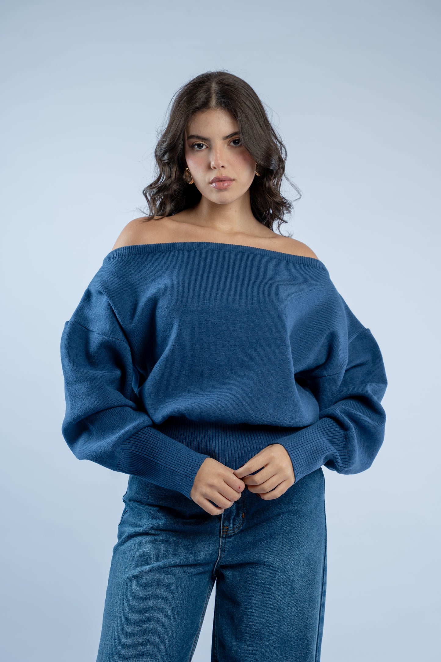 Asymmetrical waist-defined knit top