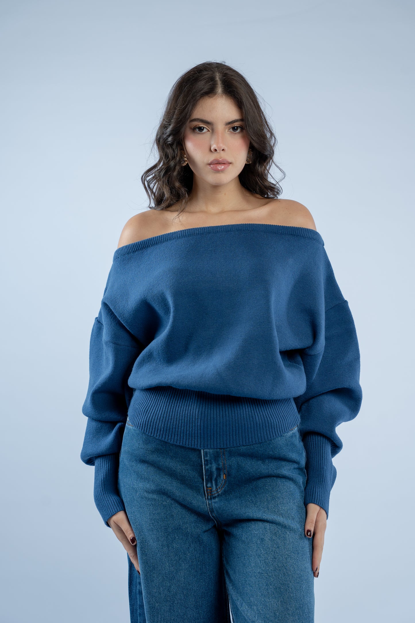 Asymmetrical waist-defined knit top