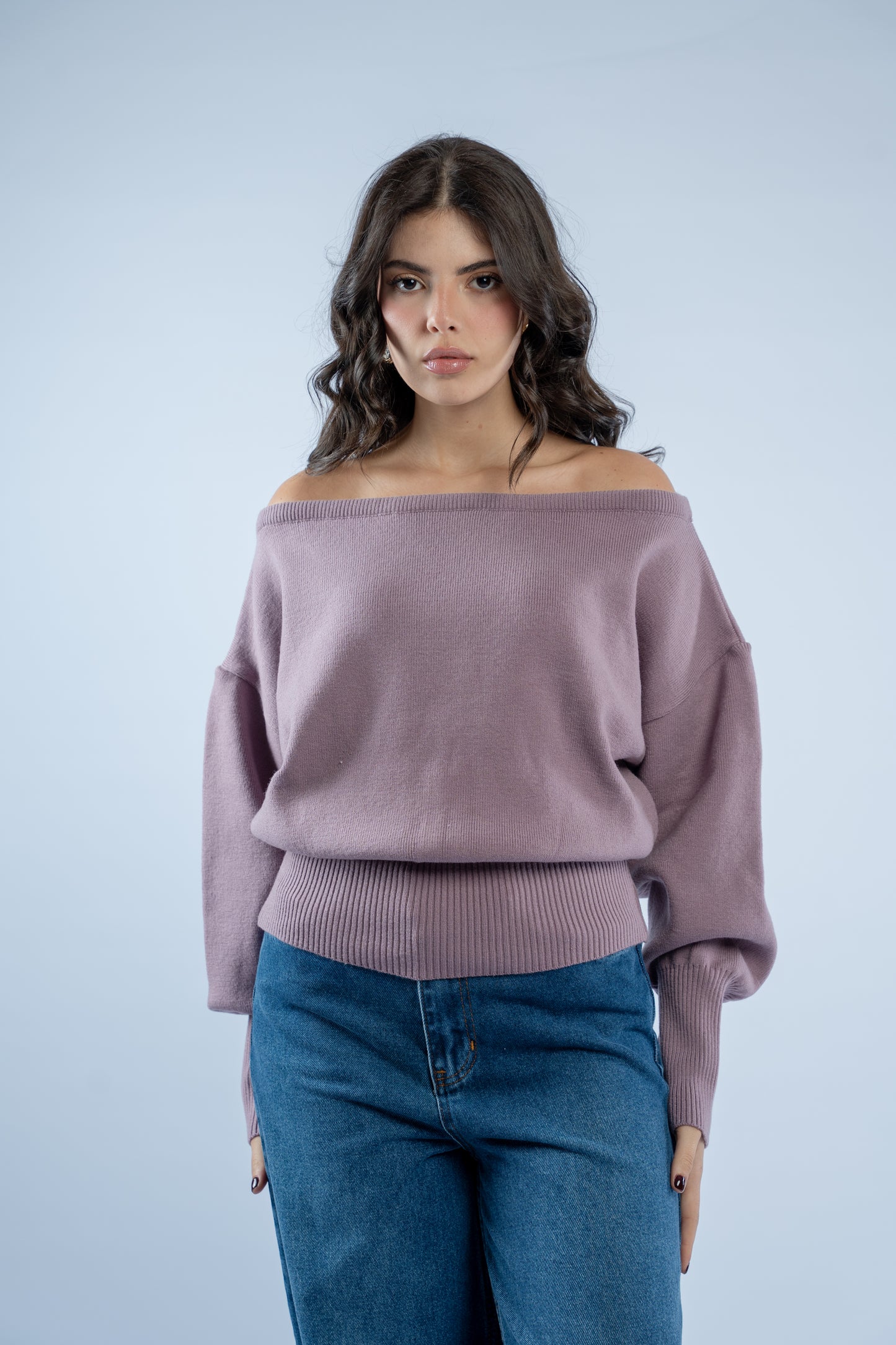 Asymmetrical waist-defined knit top