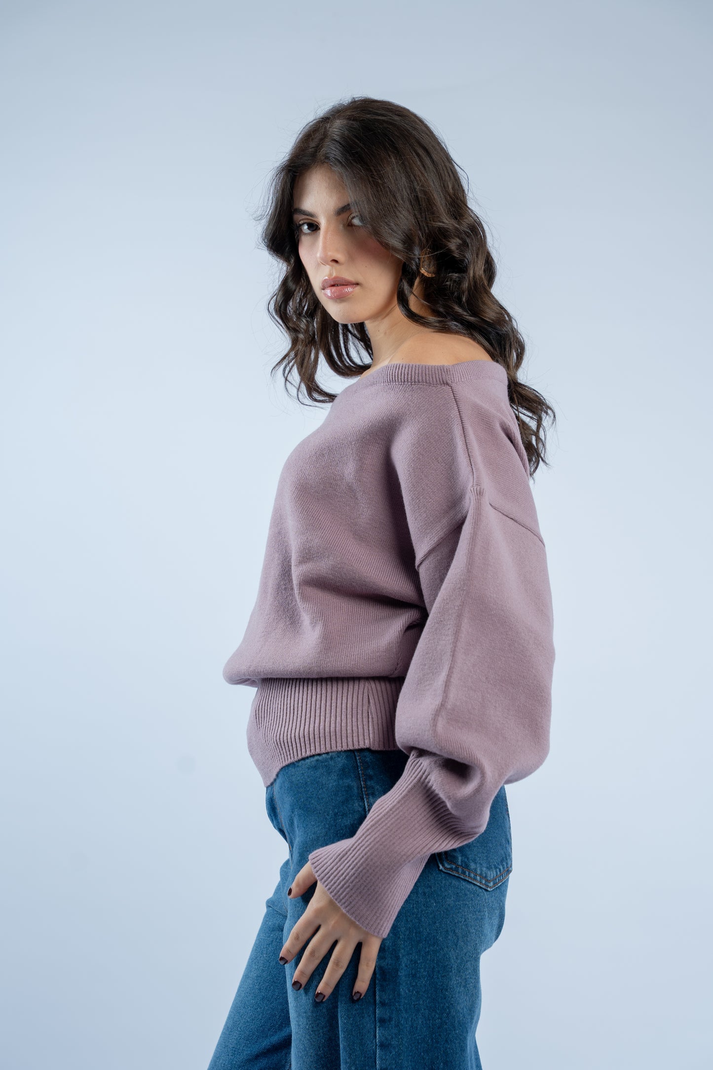 Asymmetrical waist-defined knit top