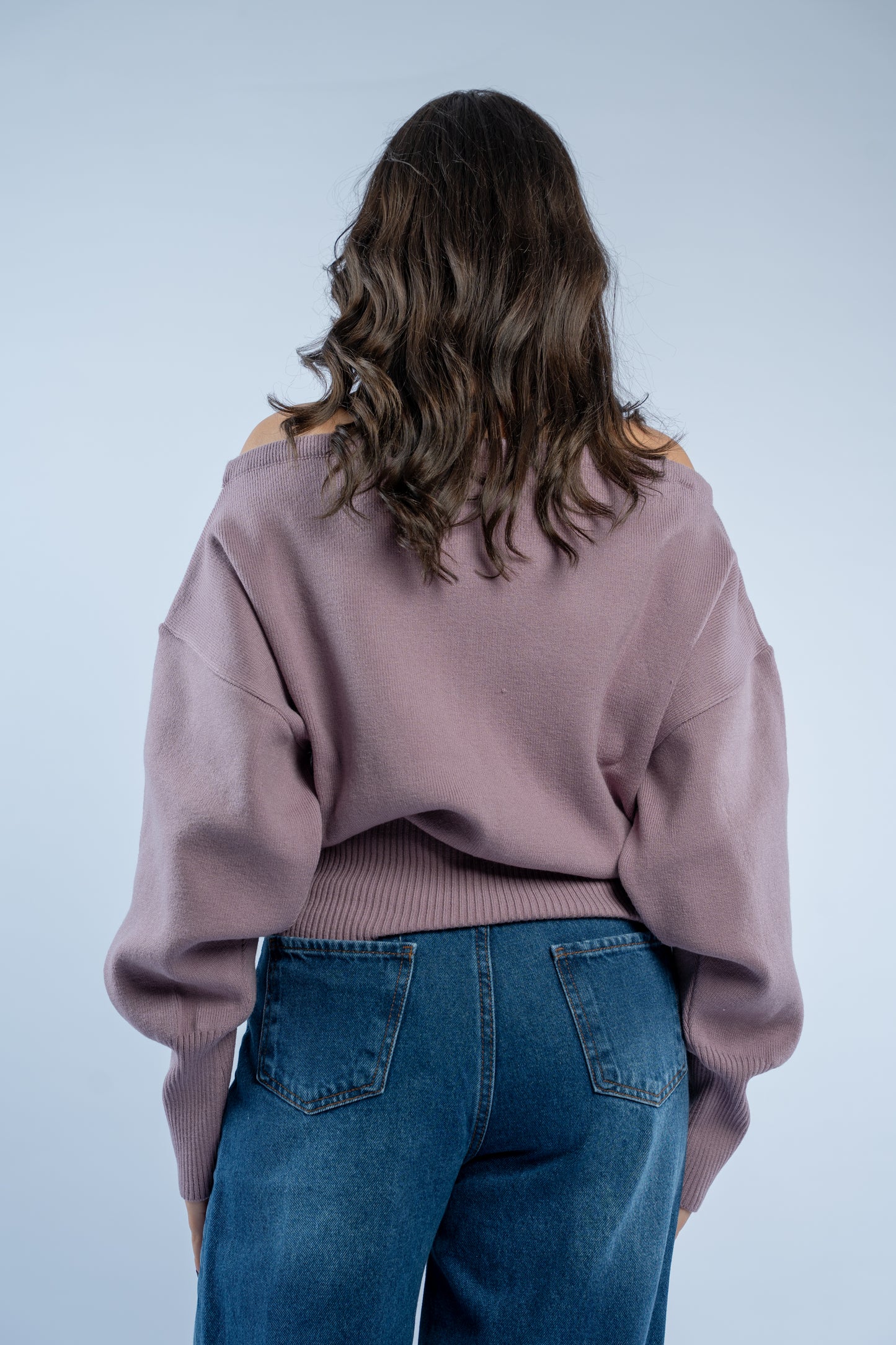Asymmetrical waist-defined knit top