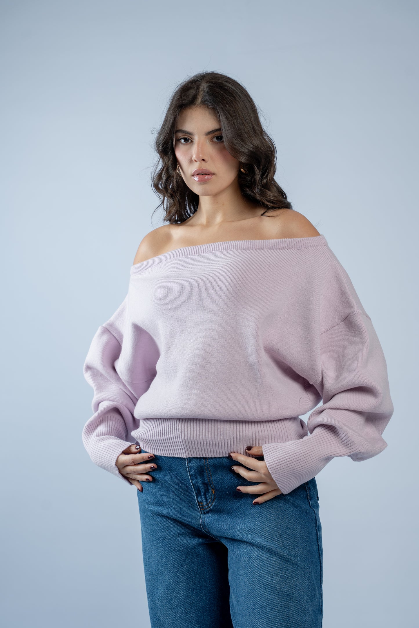 Asymmetrical waist-defined knit top