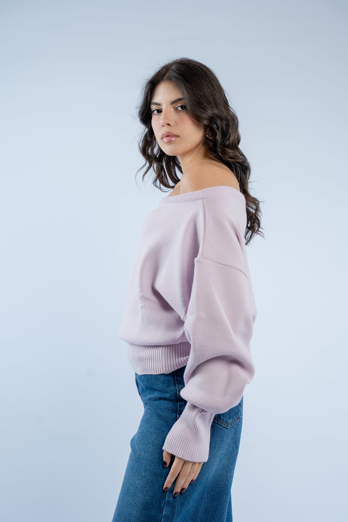 Asymmetrical waist-defined knit top