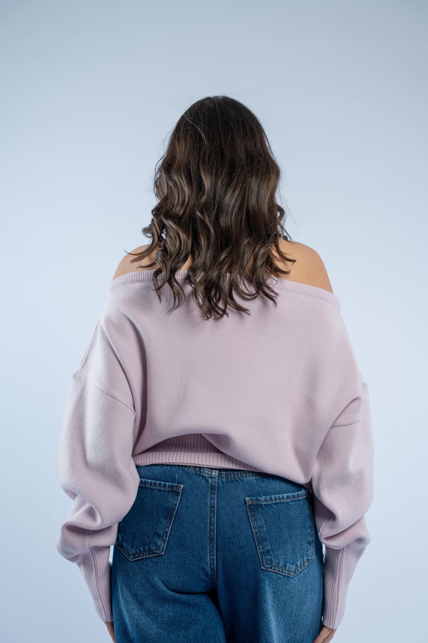 Asymmetrical waist-defined knit top