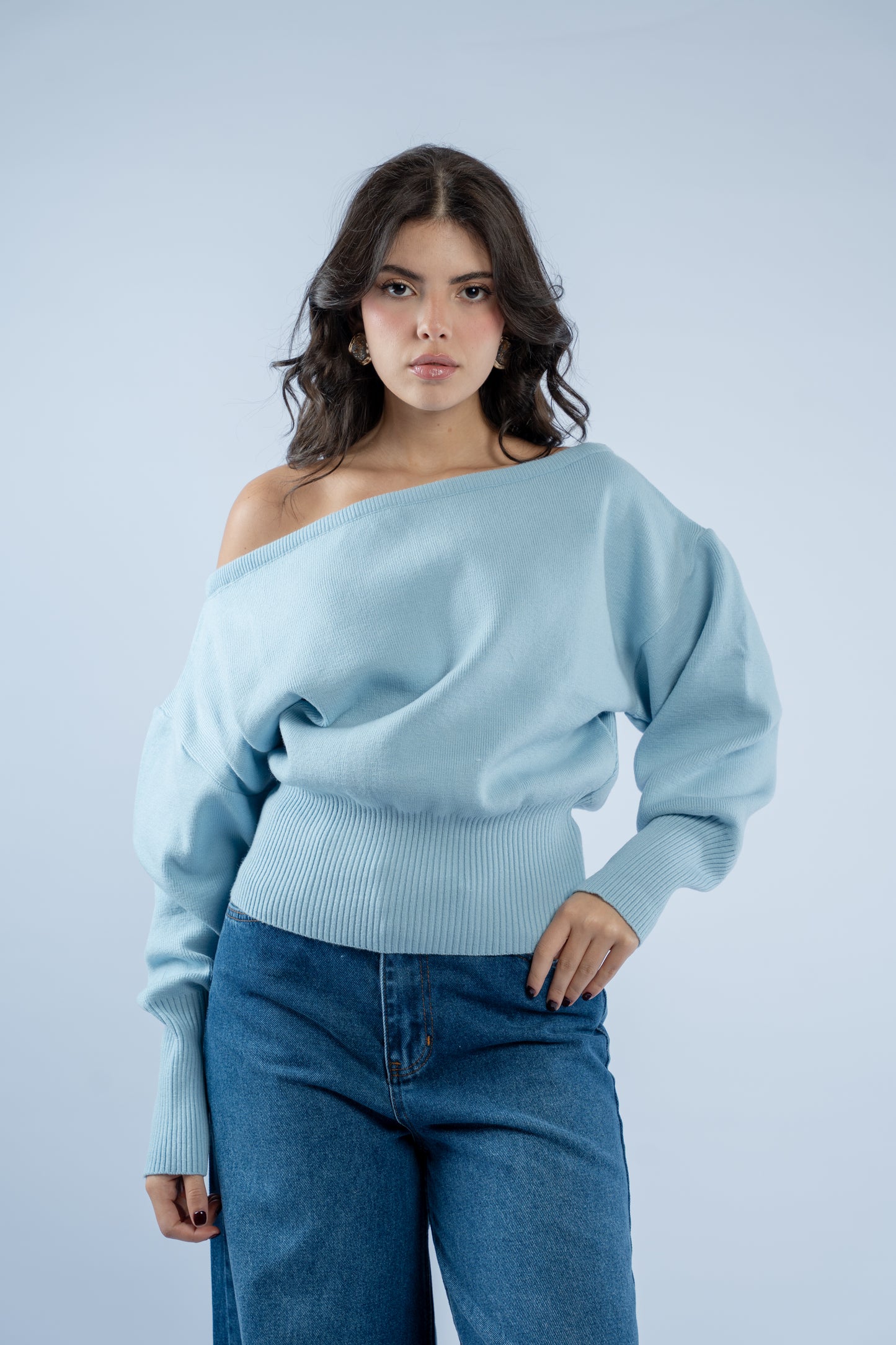 Asymmetrical waist-defined knit top