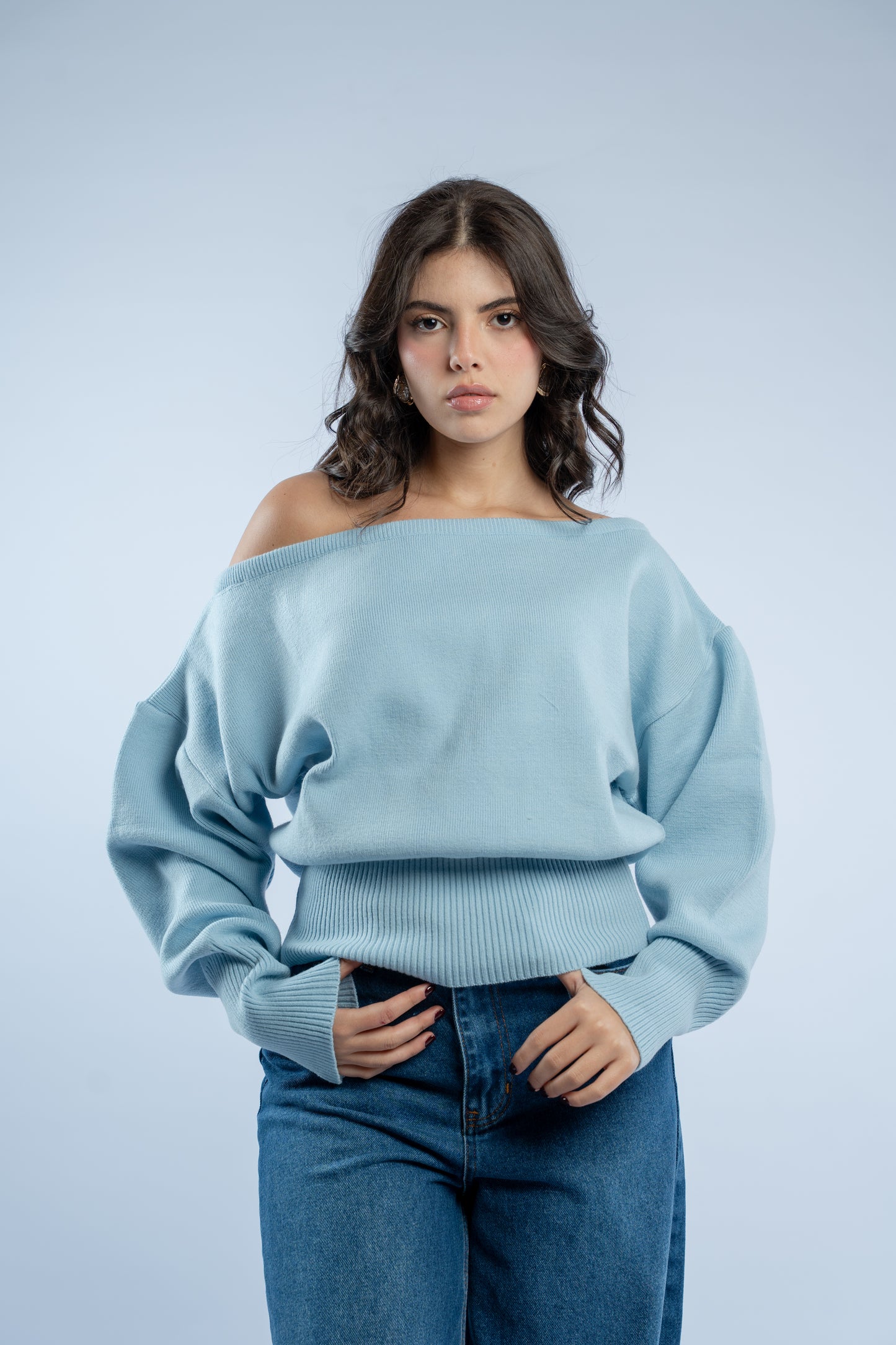Asymmetrical waist-defined knit top