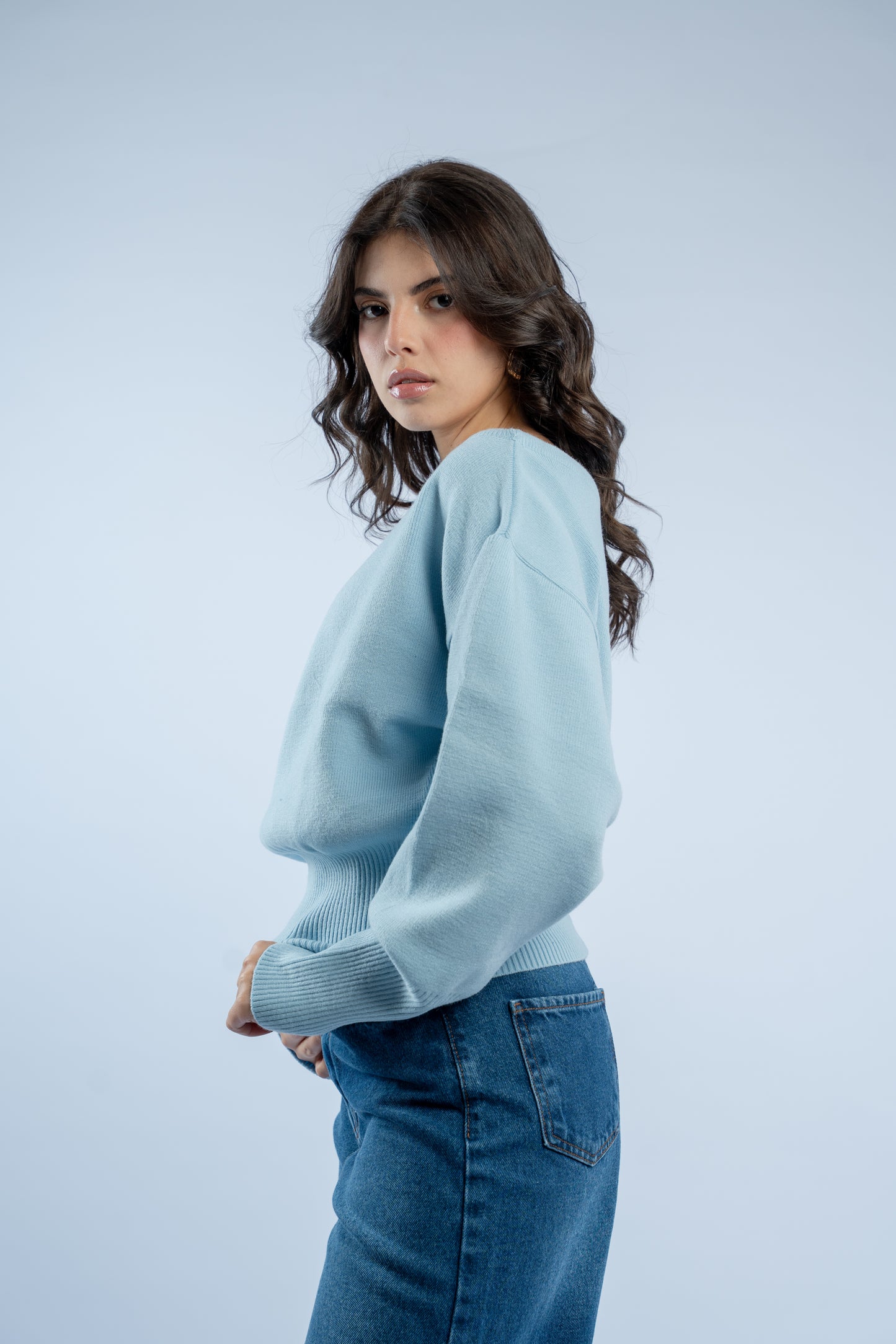 Asymmetrical waist-defined knit top