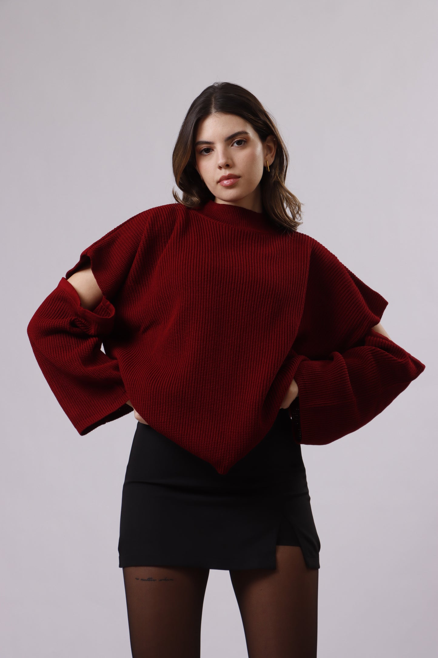 Elbow cut out wool top