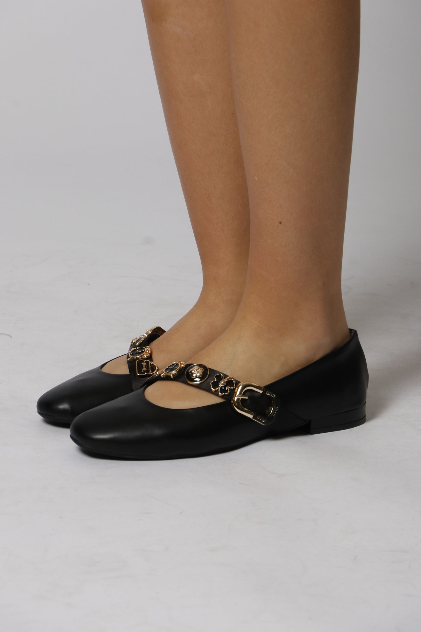Ballerina with gold buttons