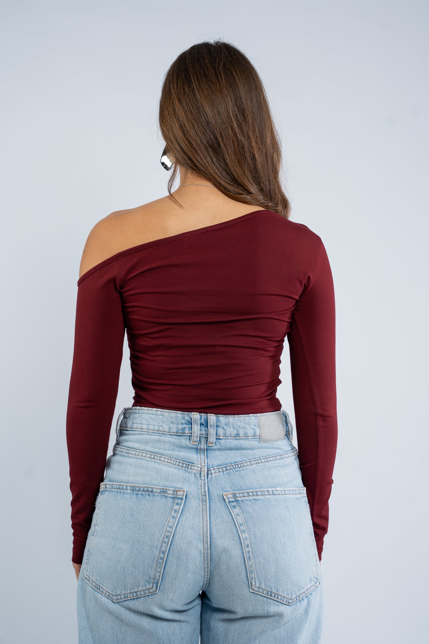 Long sleeve asymmetric shoulder top